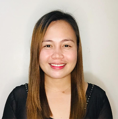 A woman with long brown hair wearing black.